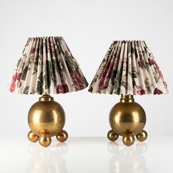 A pair of brass table lamps from Gusums Bruk.