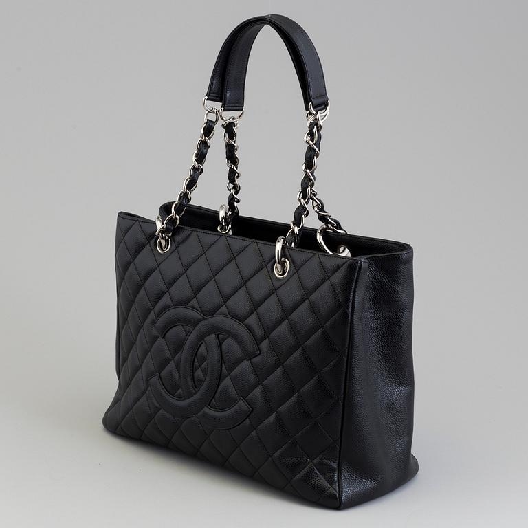 A black caviar "Shopper tote bag" by Chanel 2017.