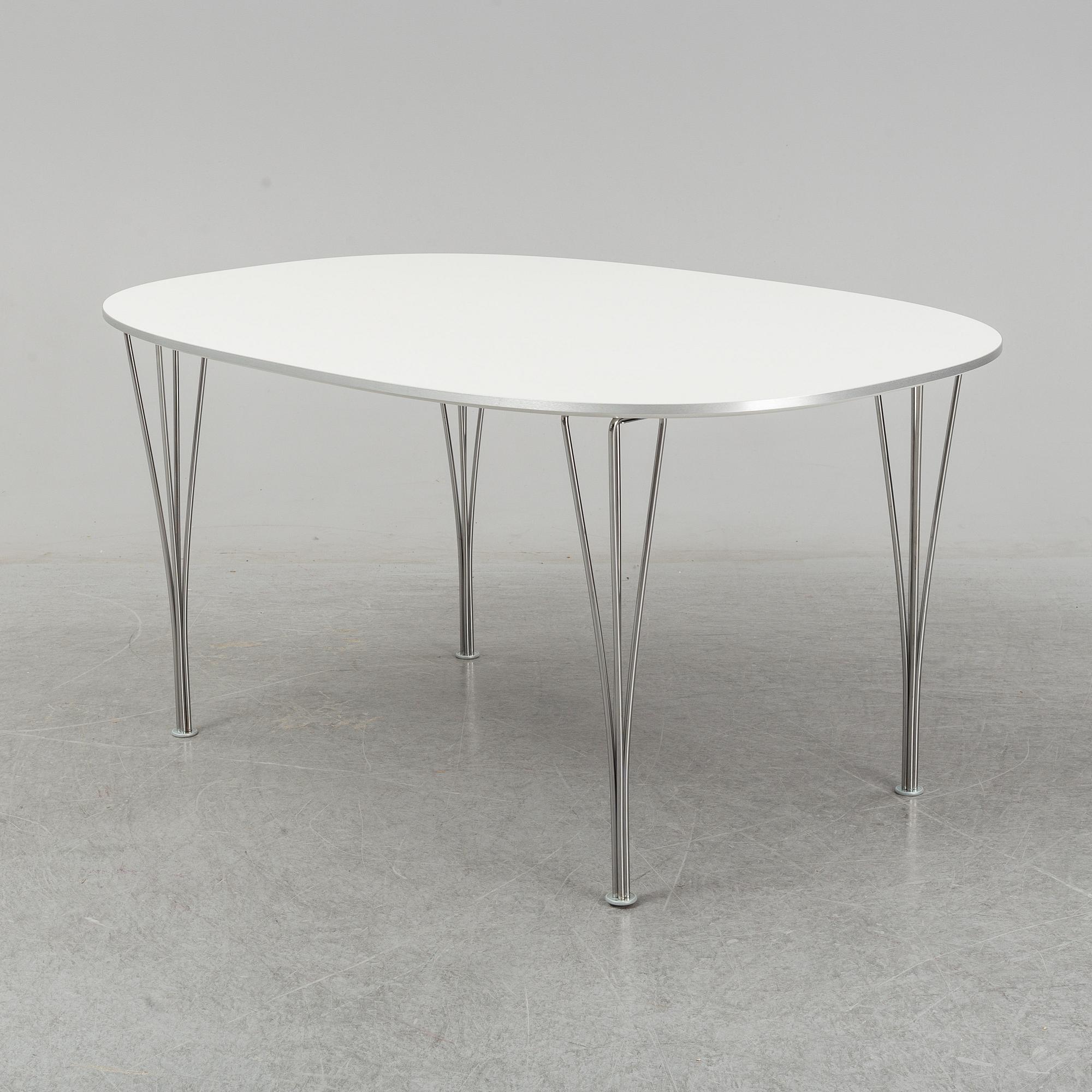 PIET HEIN & BRUNO MATHSSON, a 'Super Elliptical' dining table, Fritz Hansen, Denmark, 2014.
