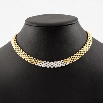 An 18K gold necklace set with round brilliant-cut diamonds.