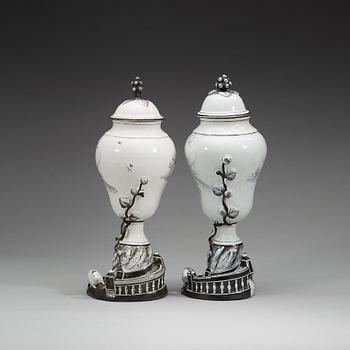 A pair of Swedish faience vases with covers, Marieberg, 18th Century.