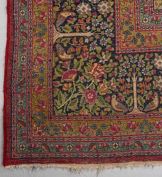 A CARPET, semi-antique Kerman, ca 360 x 284 cm.