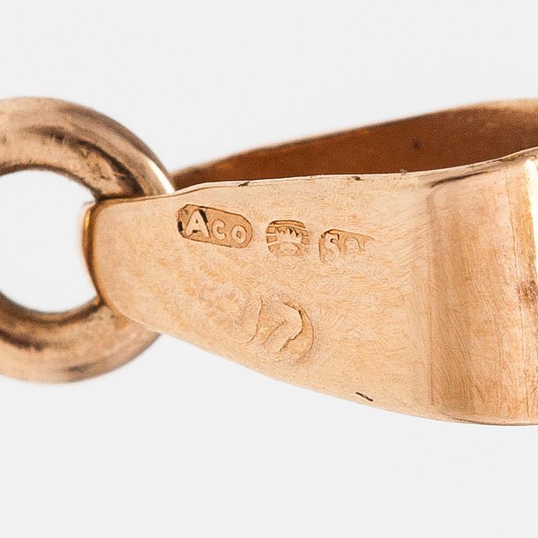 A 14K gold locket. Finnish import marks.