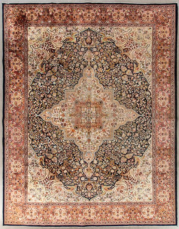 An old Ghom silk carpet ca 368 x 273 cm.