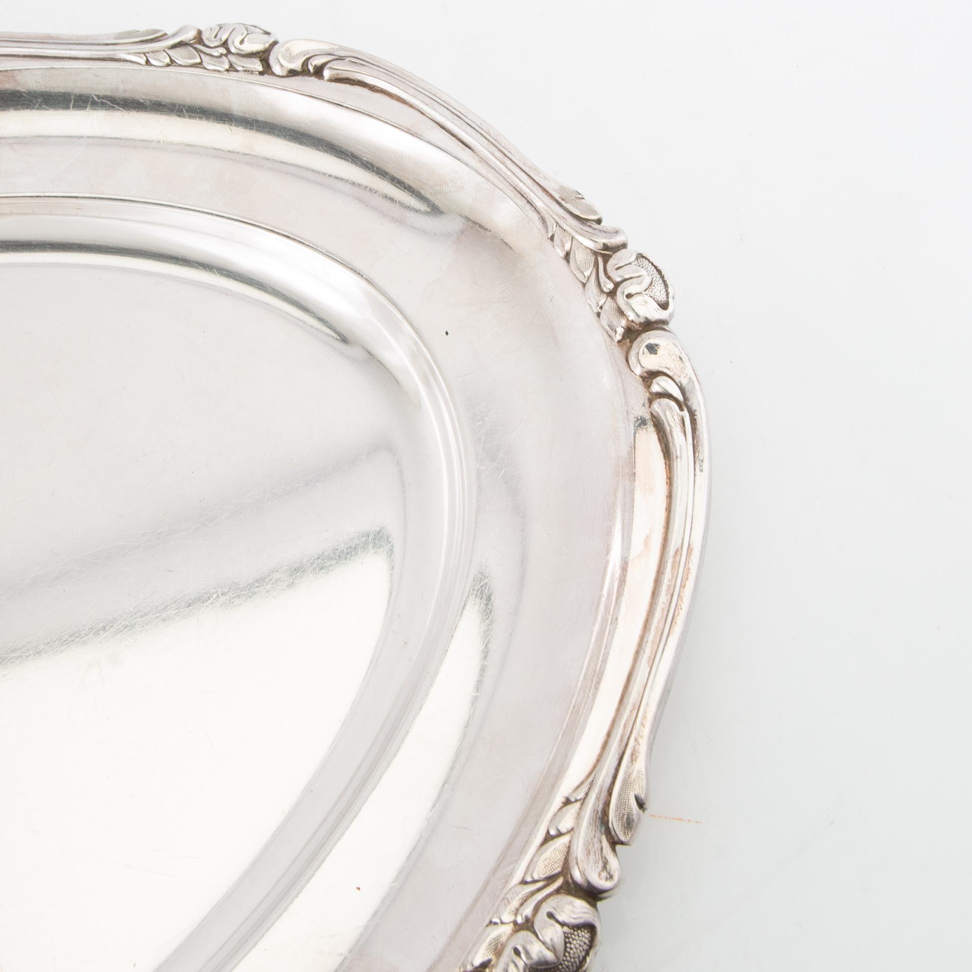 Trays/Serving platters 4 pcs of silver-plated metal, first half of the 20th century.