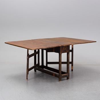 A 19th Century painted gate leg table.