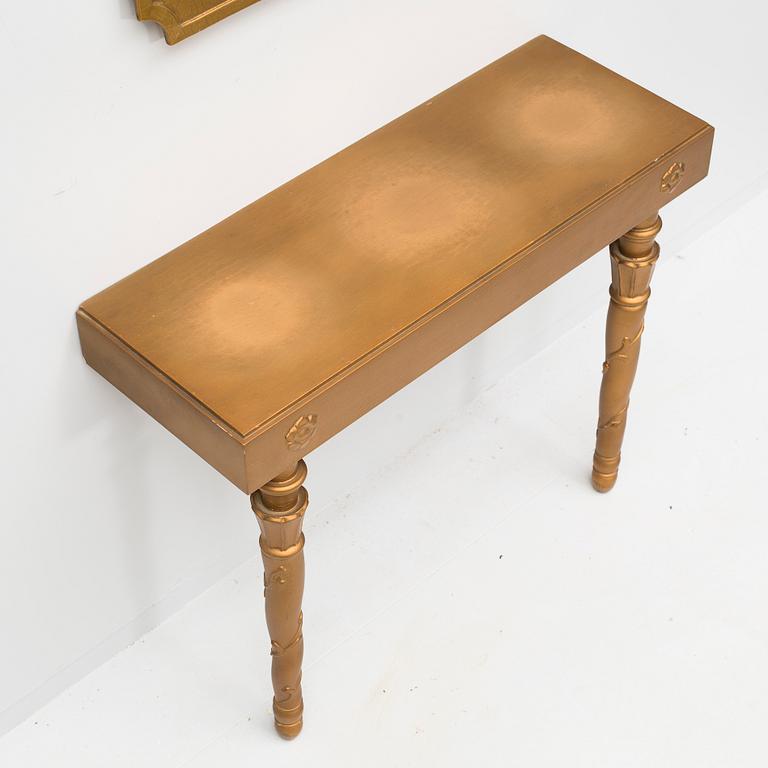 A mirror with table, first half of the 20th century.
