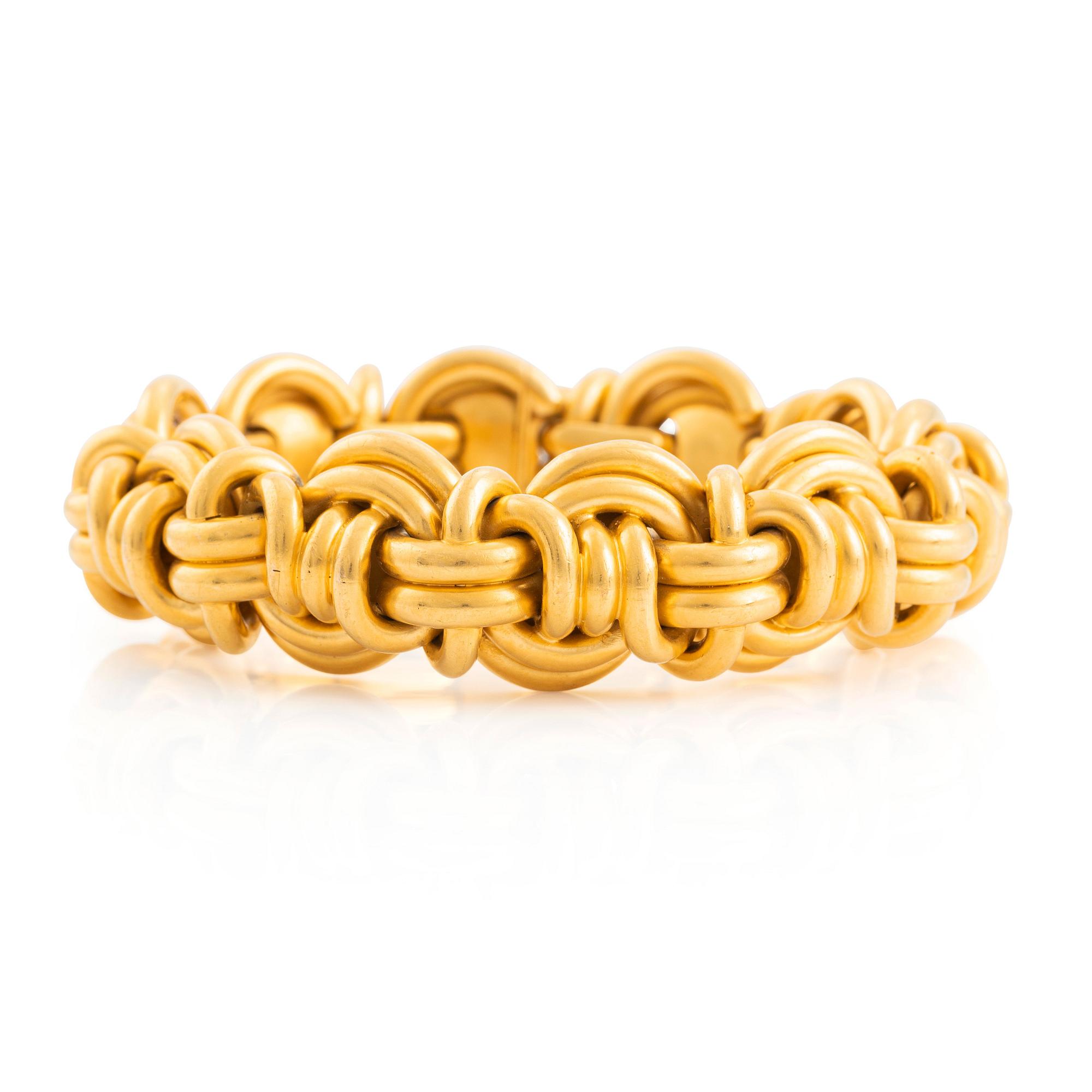 An 18K gold bracelet.