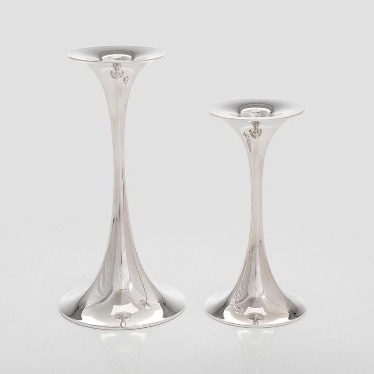 Tapio Wirkkala, A set of four silver candlesticks, "Trumpetti", Kultakeskus, Hämeenlinna 1979 and 1990.