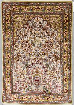 Two chinese silk rugs, around 96 x 63 and 91 x 63 cm.