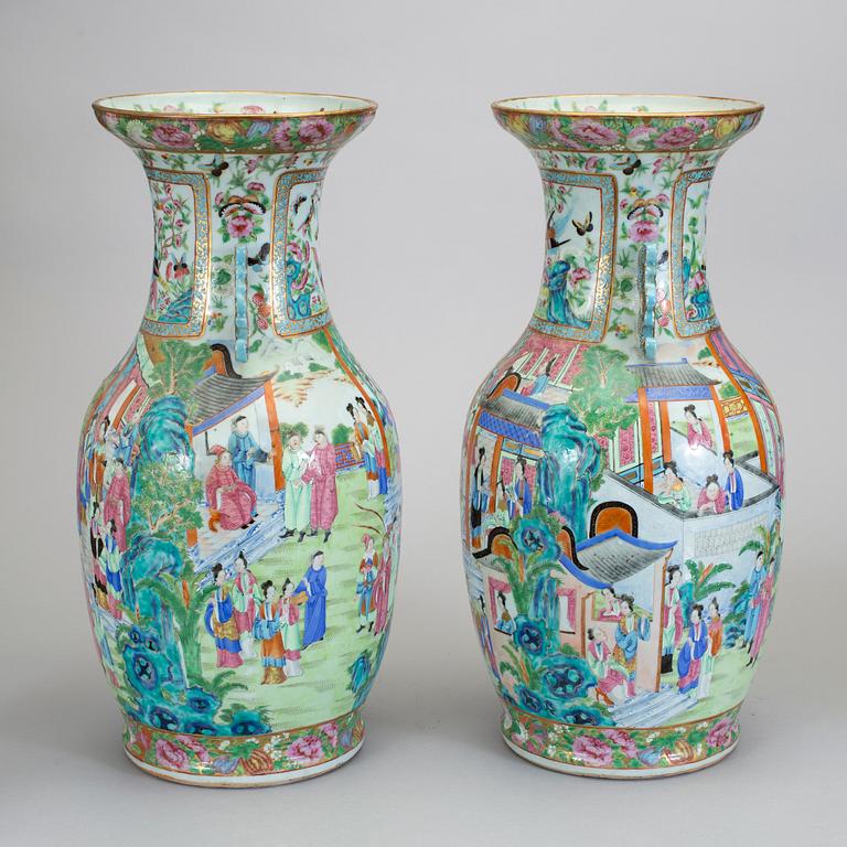 A pair of famille rose Canton vases, Qing dynasty, 19th Century.