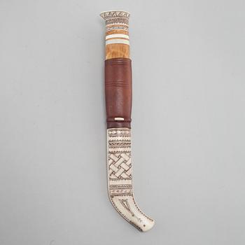 A knife by Paul Larsson, signed and dated 1988.