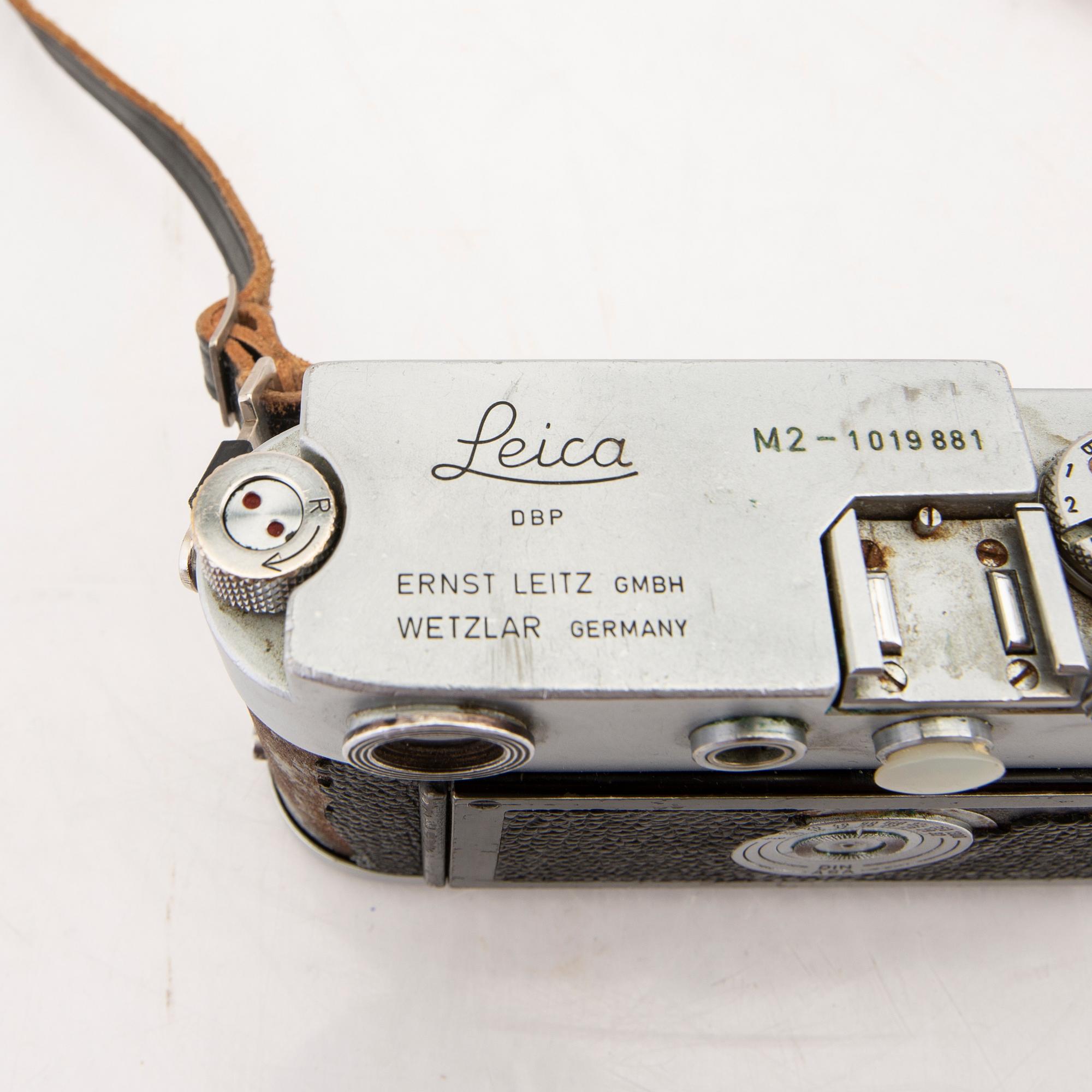Leica camera with 2 lenses from the middle of the 20th century.