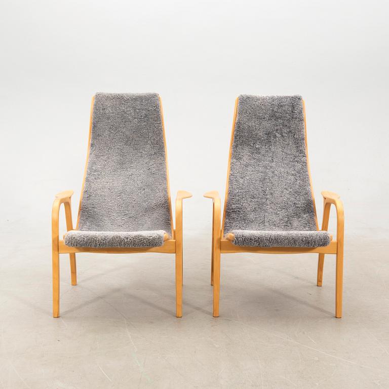 Yngve Ekström, a pair of "Lamino" armchairs for Swedese, late 20th century.