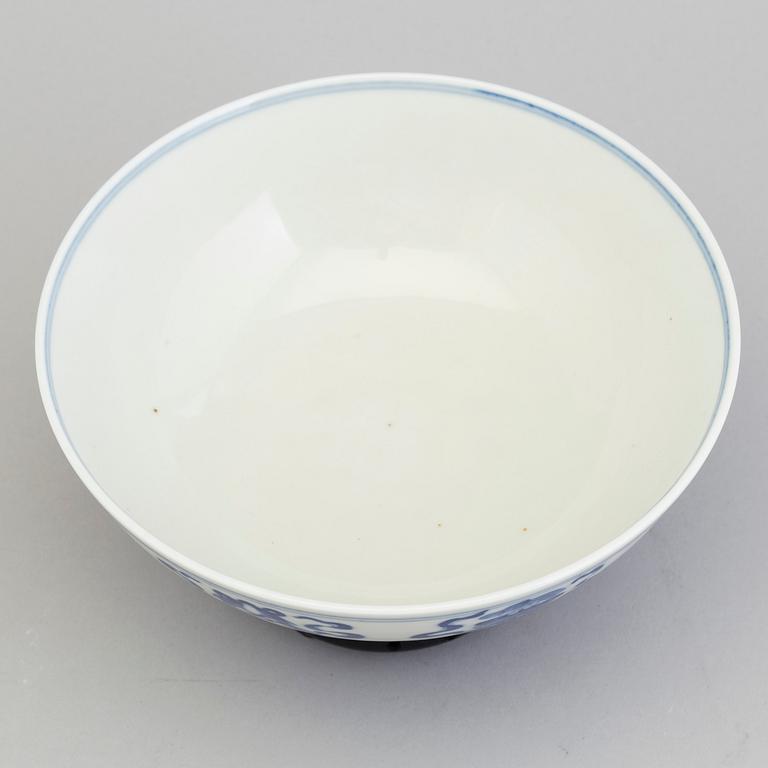 A chinese blue and white porcelain bowl, 20th century, with Guangxu's six character mark.