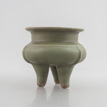 A Chinese celadon tripod censer, late Ming dynasty, for the Southeastern market.