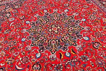 A Najafabad carpet, c. 351 X 305 cm.