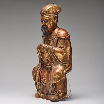 A large wooden sculpture of a Daoist dignitary, Qing dynasty, 17/18th Century.