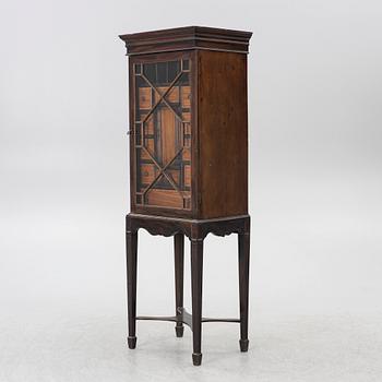 Display cabinet, likely England 19th century.