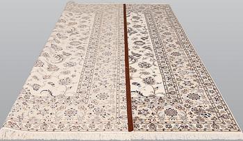 A part silk Nain carpet, so-called 6LAA, approx. 308 x 254 cm.