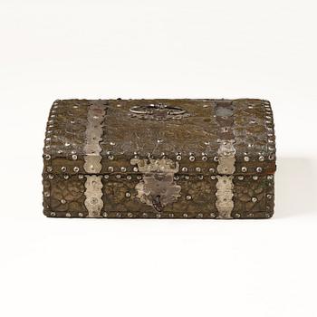 A presumably German baroque repoussé brass writing box, late 17th century.