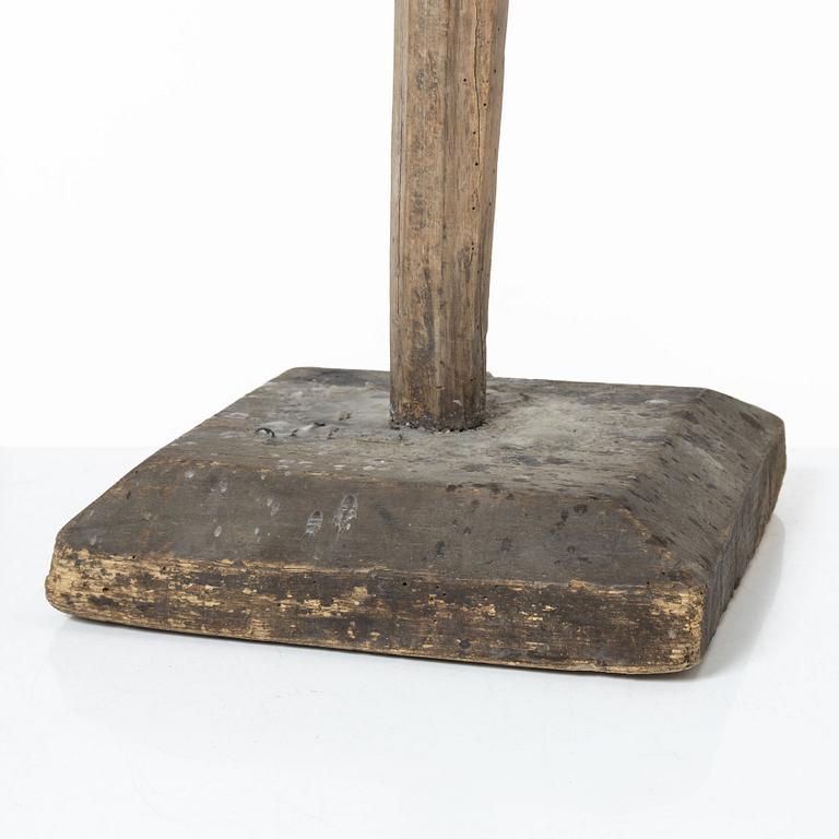 A candle stick, 19th/20th Century.