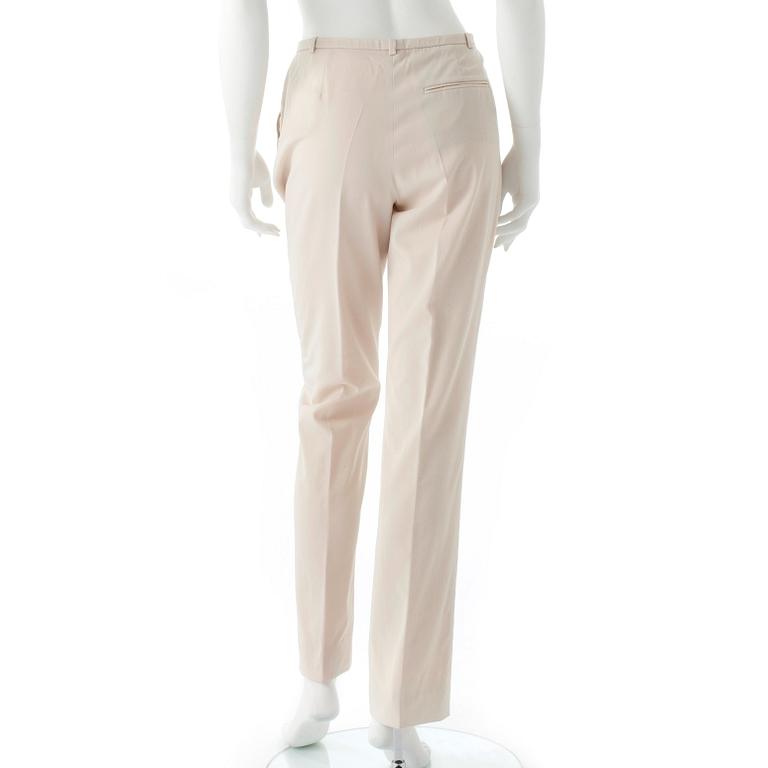 HERMÈS, a pair of creme colored silk pants.