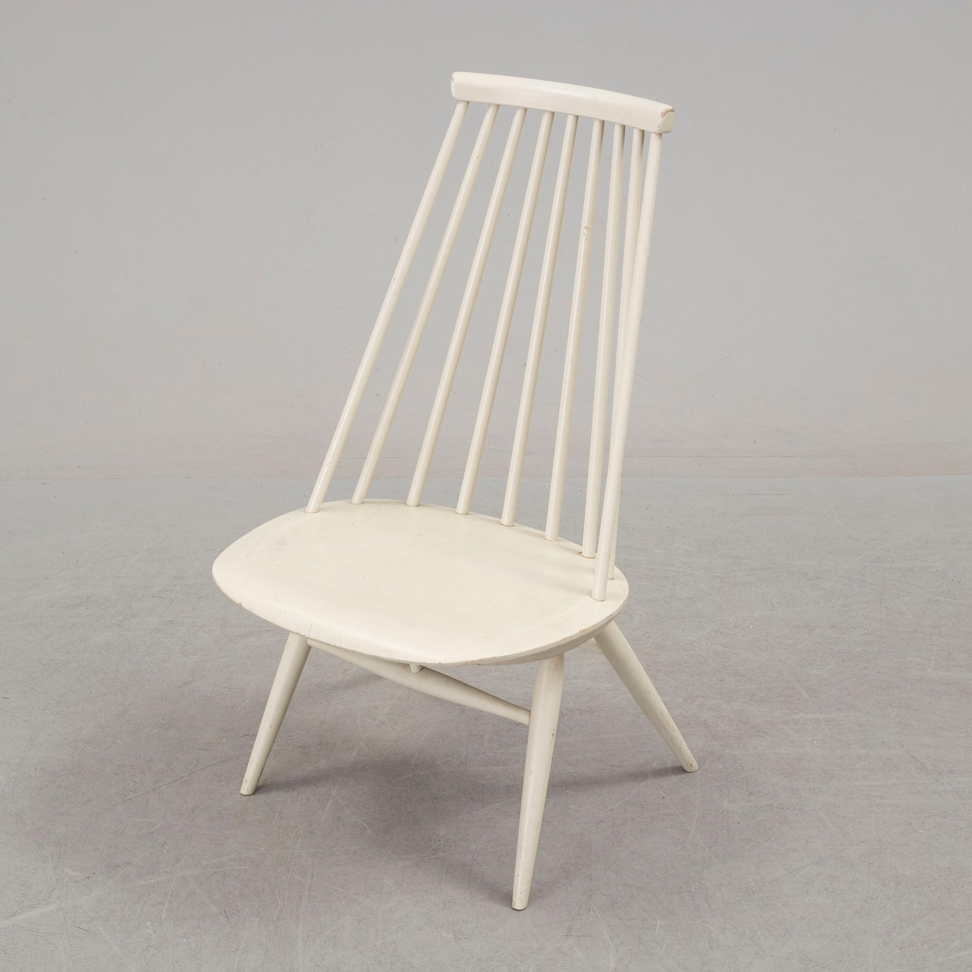 A second half of the 20th century 'mademoiselle' chair by Ilmari Tapiovaara.