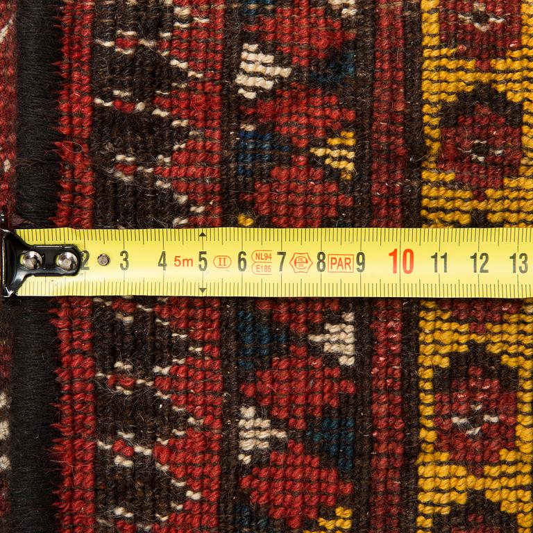An Antique Beshir carpet, ca 183 x 390 cm.