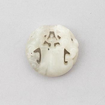 A Chinese stone pendant, 20th century.