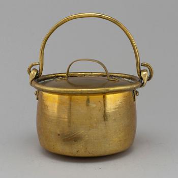 A 19th century brass saucepan.