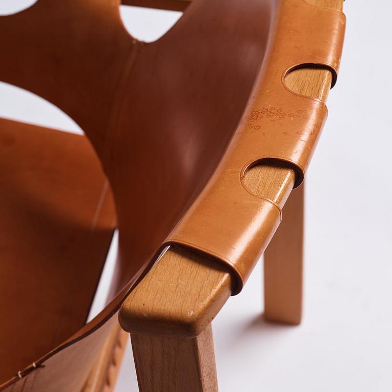 Carl-Axel Acking, an oak and brown natural leather 'Trienna' chair, Nordiska Kompaniet, Sweden.