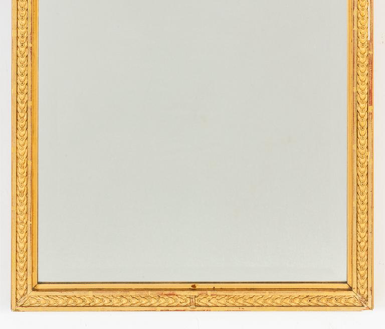 A gustavian style mirror, first half of the 20th century.