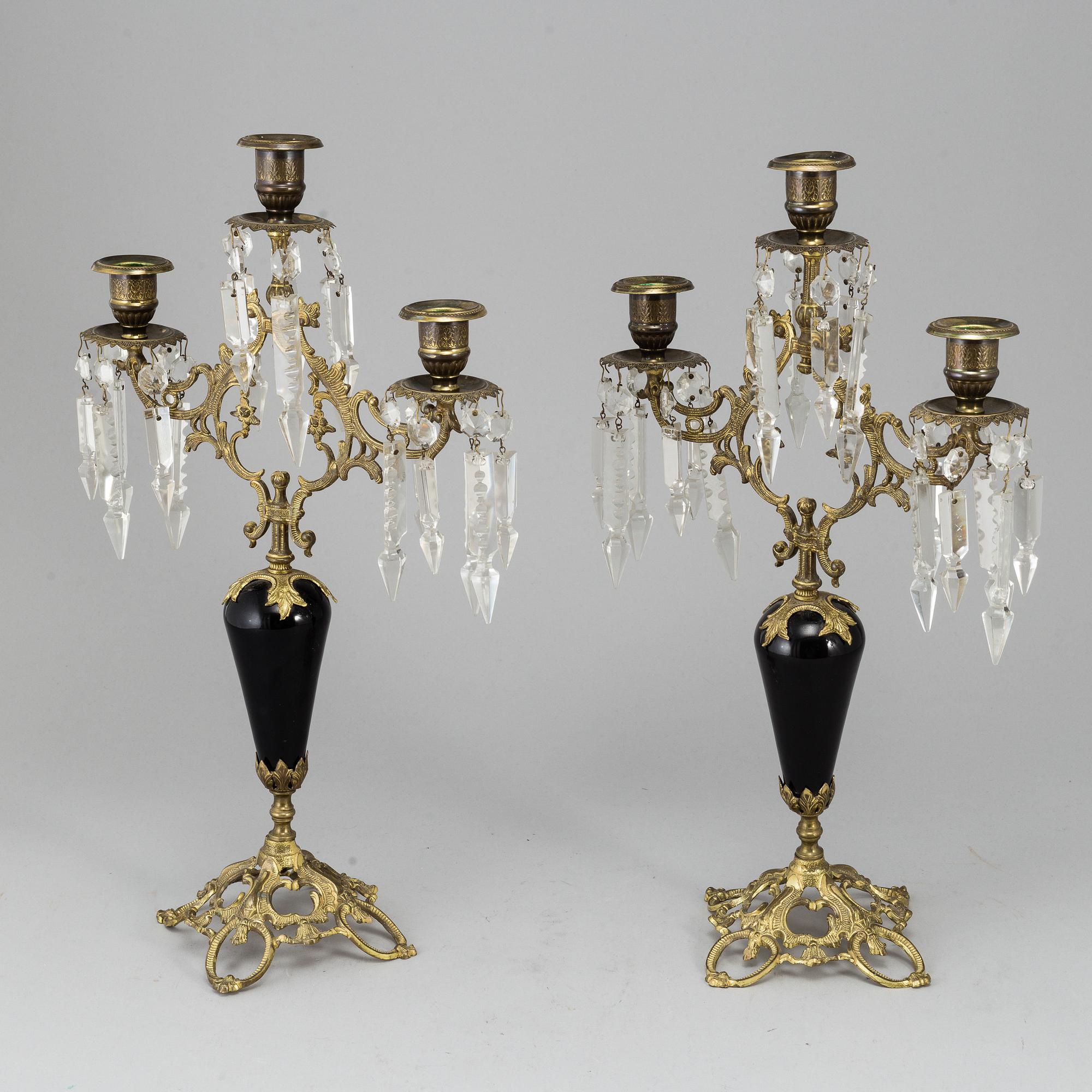 A pair of Victorian brass candelabra from around year 1900.