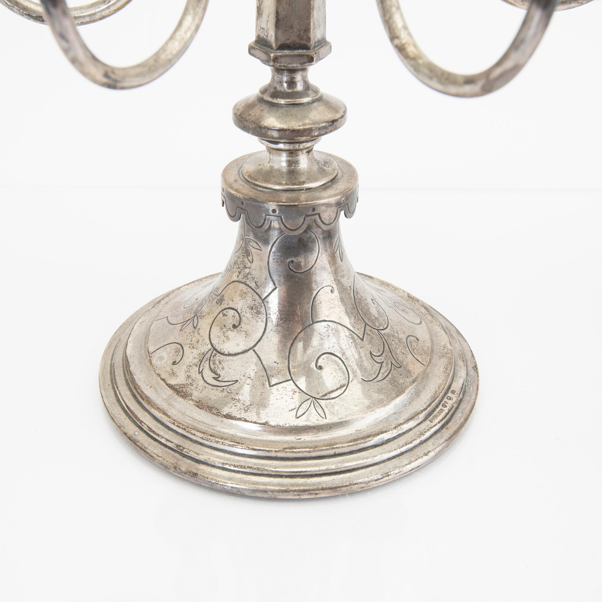 A Swedish 20th century pair of silver candelabras mark of CG Hallberg Stockholm 1928 possibly Elis Bergh.
