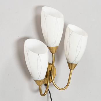 A mid 20th century wall lamp for Itsu Finland.