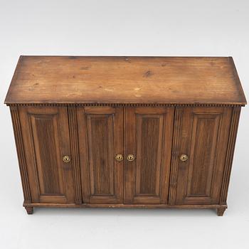 A Gustavian pine cupboard, late 18th century.