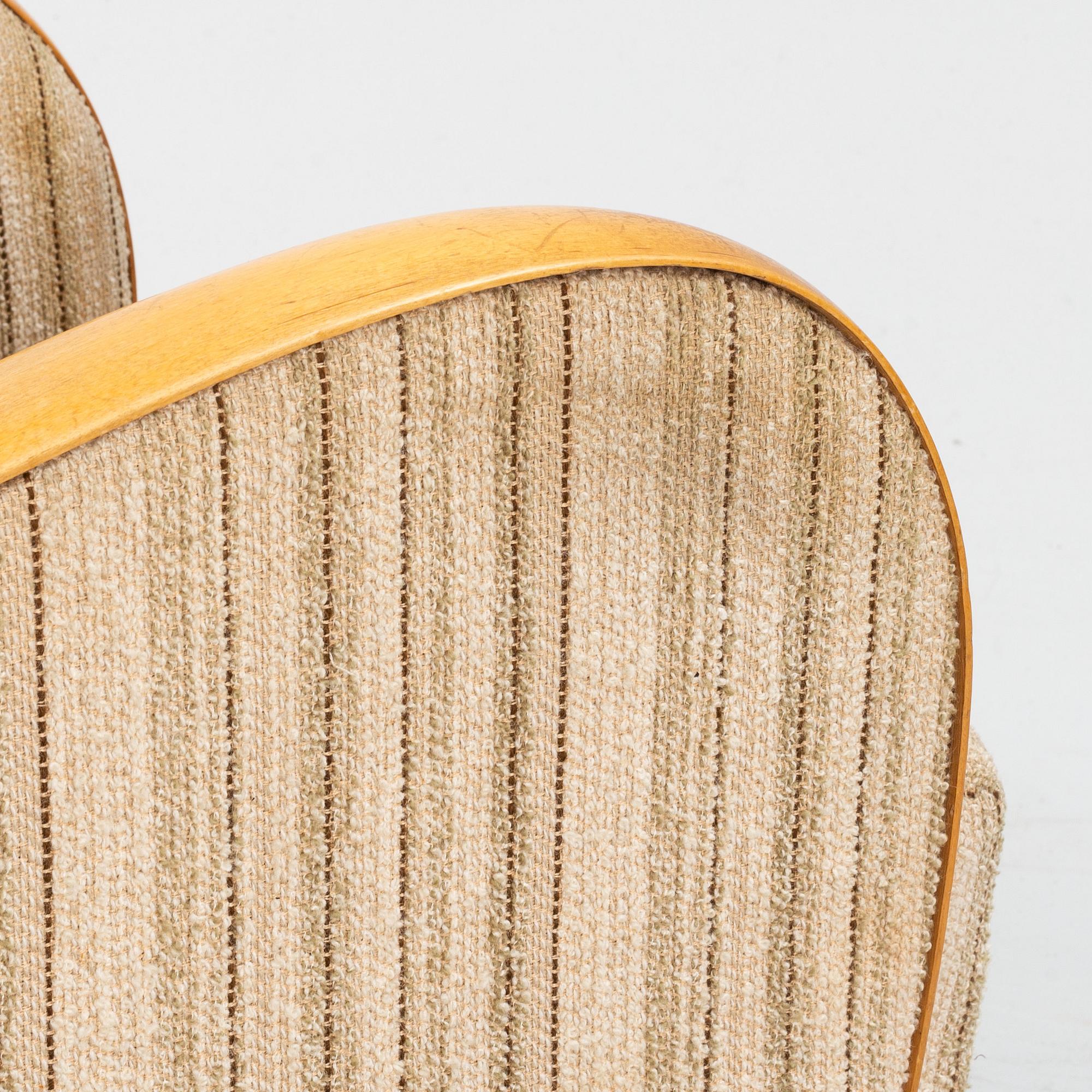 A pair of Swedish Modern easy chairs, Dux T-serie, 1940's/50's.
