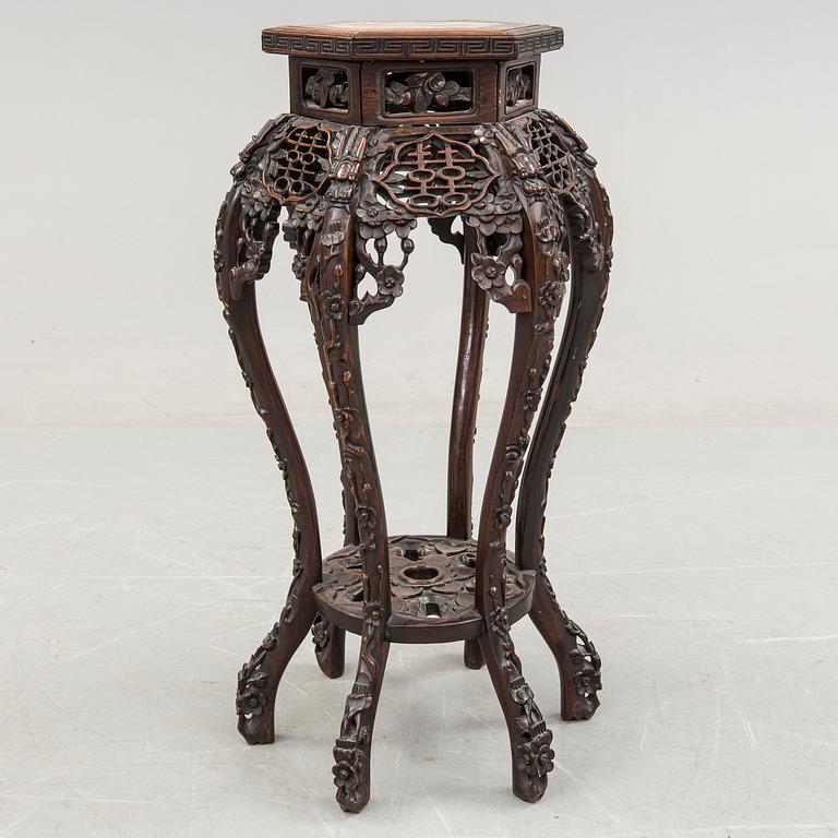 A Chinese carved wood pedestal, 20th Century.