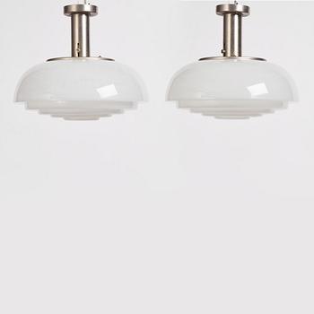 Harald Notini, a pair of ceiling lamps, model "11321", Arvid Böhlmarks Lampfabrik, 1940s.