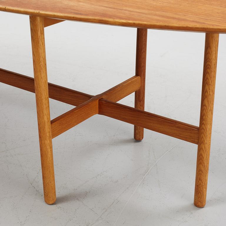 Kerstin Hörlin-Holmquist, an oak and teak coffee table, from the Triva-series, Nordiska Kompaniet, Stockholm, 1960s.