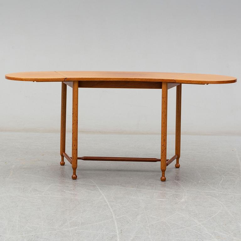 JOSEF FRANK, a model 1333 mahogany table from Firma Svenskt Tenn.