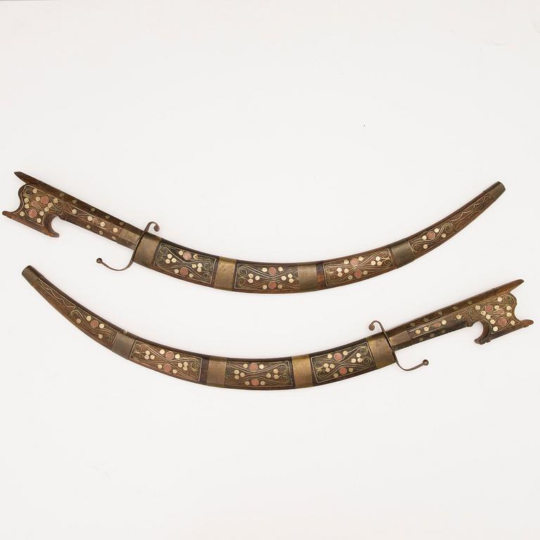 Pair of North African Nimcha short swords, first half of 20th Century.