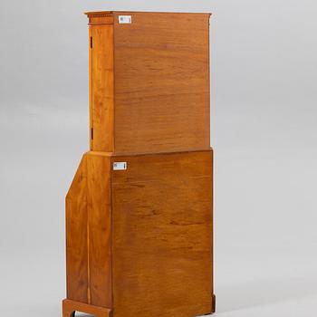 Slant-front secrétaire with glazed cabinet section, 20th century.