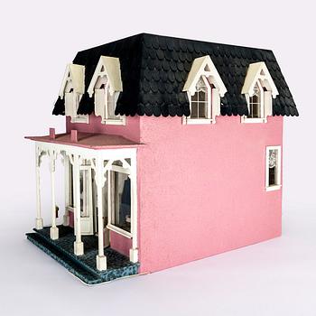 A handmade dolls house later part of the 20th century.