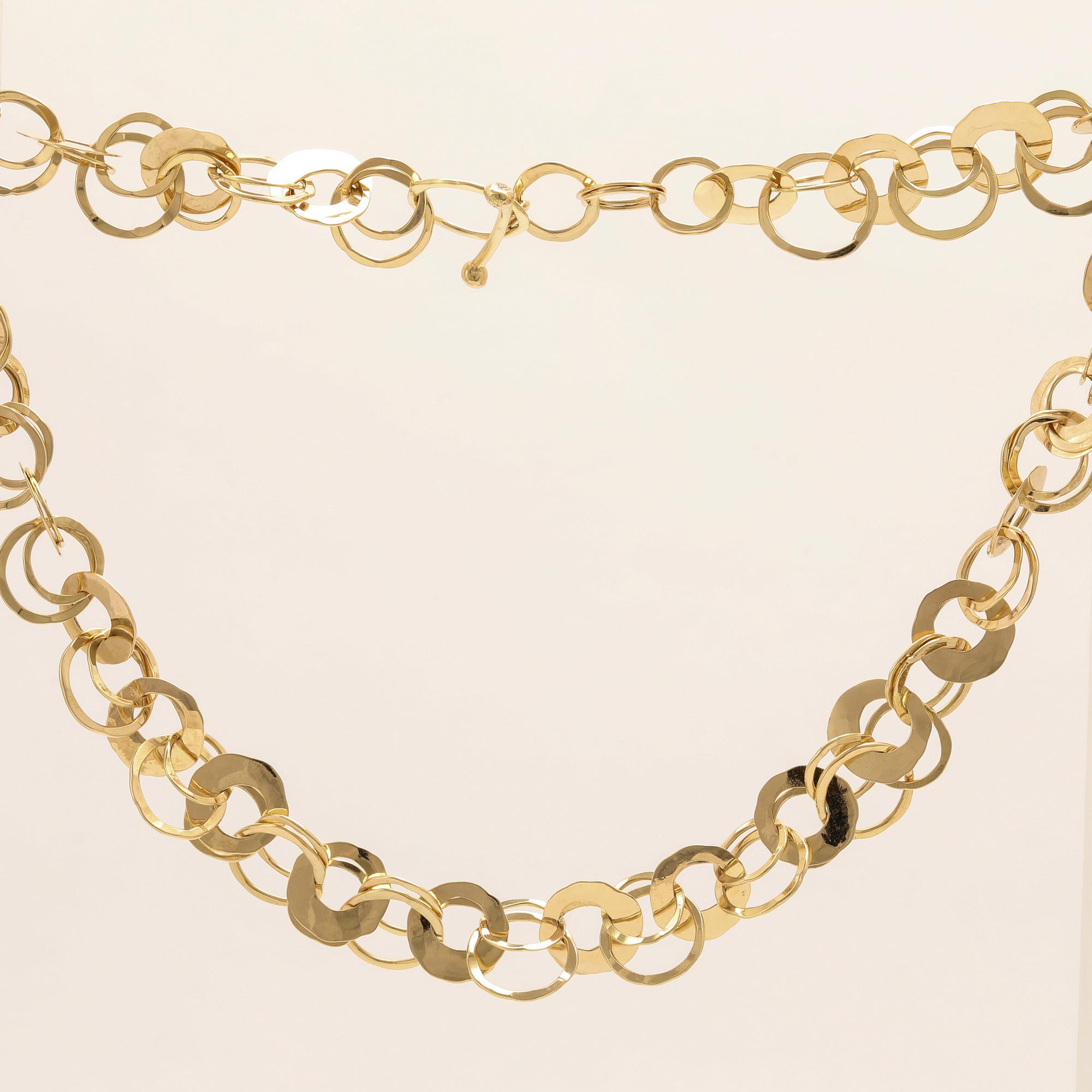 An 18K gold necklace by Cusi Italy.
