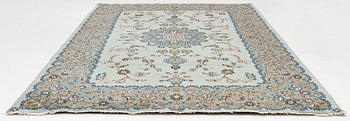 A Keshan carpet, signed, c. 376 x 270 cm.
