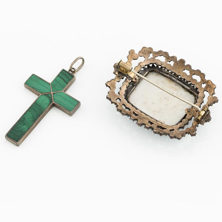 Pendant, cross, and brooch.