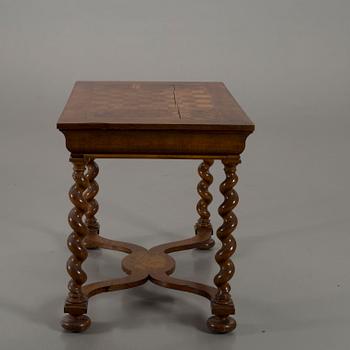 A Swedish Baroque style game table 19th century.