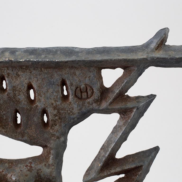 A cast iron fire guard by Olle Hermansson, Husqvarna.